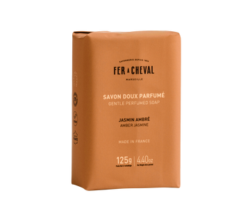 Brown soap packaging with 'Fer a Cheval' branding on a white background.