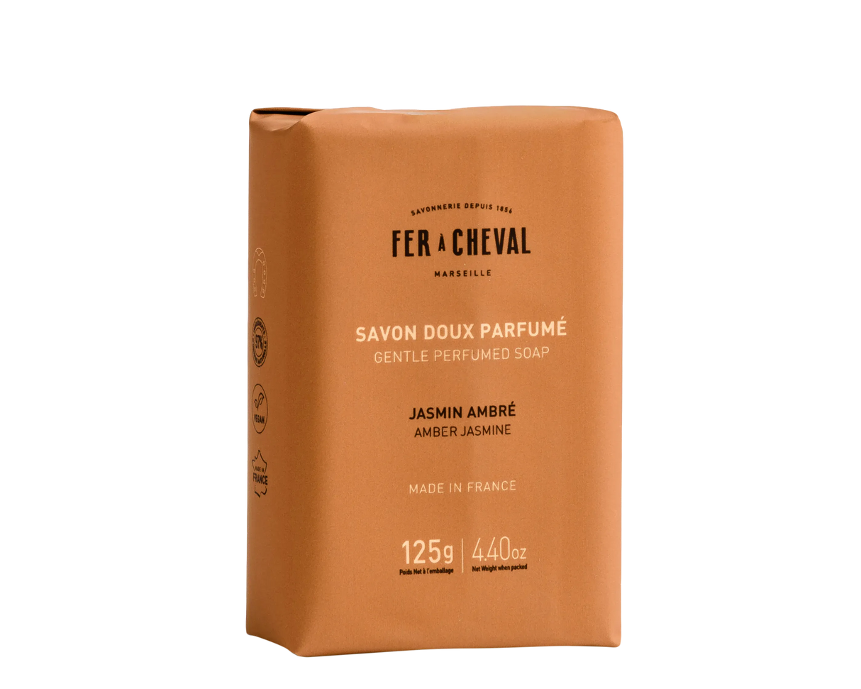 Brown soap packaging with 'Fer a Cheval' branding on a white background.