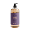 Bottle of Marseille liquid soap with a purple label on a white background