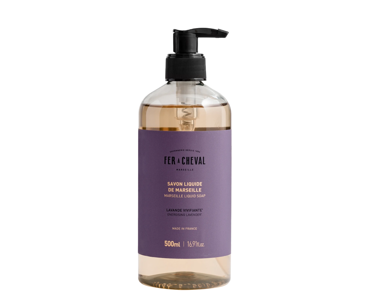 Bottle of Fé ç Cheval liquid soap with a pump on a white background