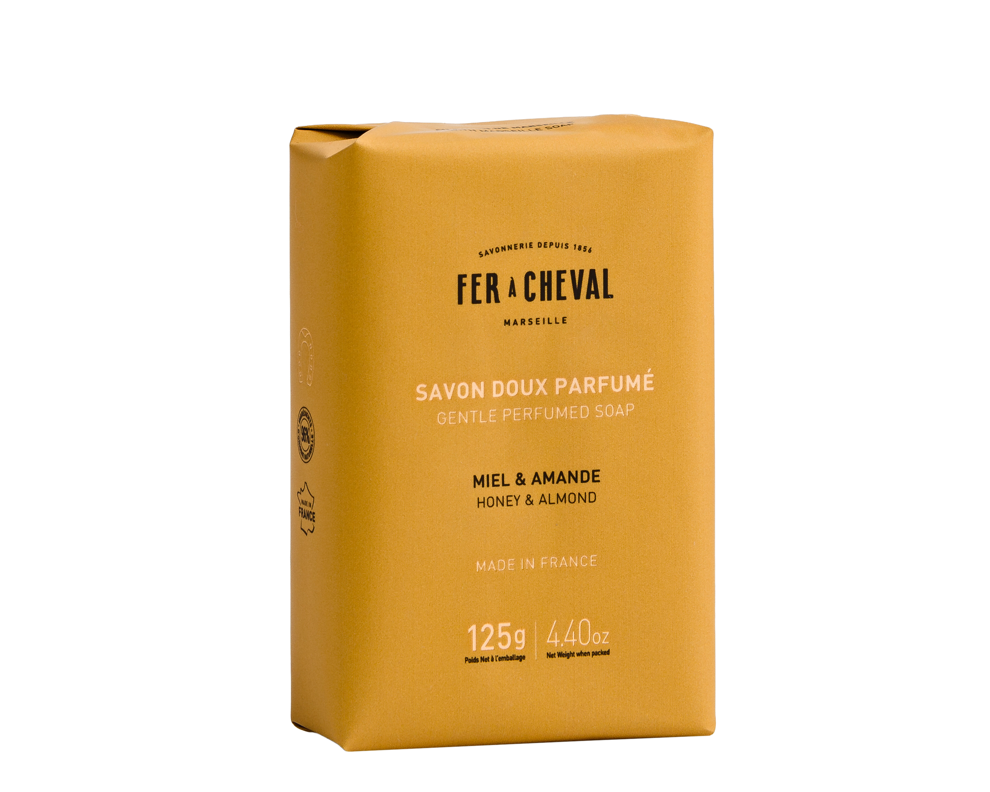 Yellow soap bar packaging with 'Fer a Cheval' branding on a white background