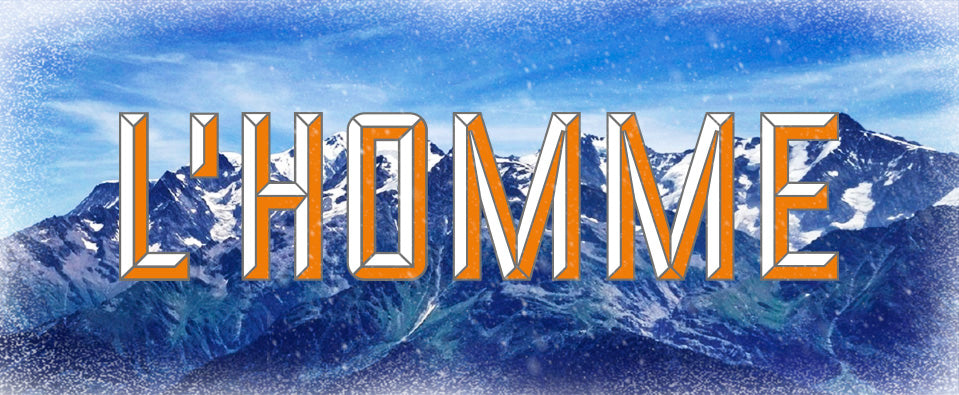 image of mountains with L'Homme logo