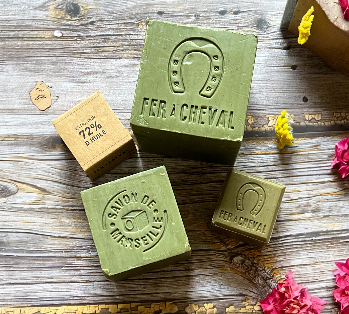 Flatlay photo of Savon de Marseille Cubes in three sizes