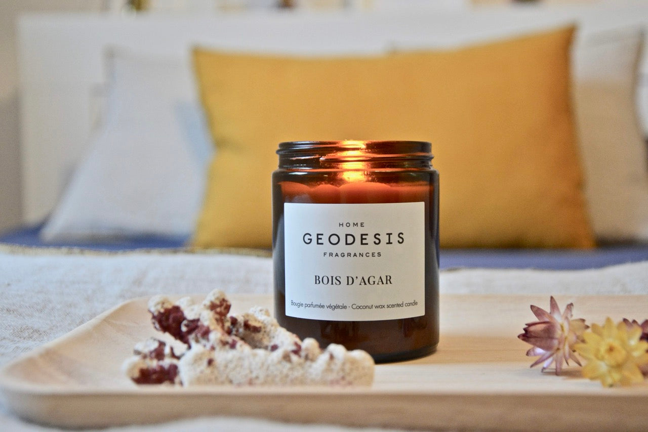 Agar Wood Candle, lit on a tray