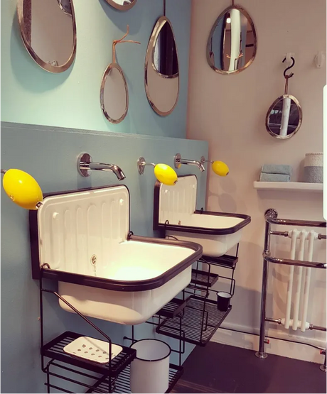 bathroom with rotating wall arm soaps