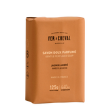 Brown soap packaging with 'Fer a Cheval' branding on a white background.