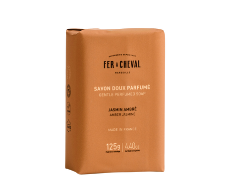 Brown soap packaging with 'Fer a Cheval' branding on a white background.