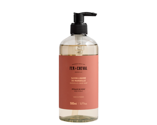 Bottle of Fx Cheval liquid soap with a pump on a white background