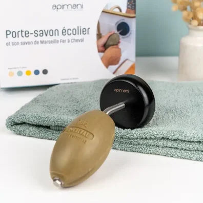 Soap holder with a towel on a white surface, featuring the brand 'apimani'.