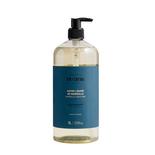 Bottle of Marseille Liquid Soap with a blue label on a white background