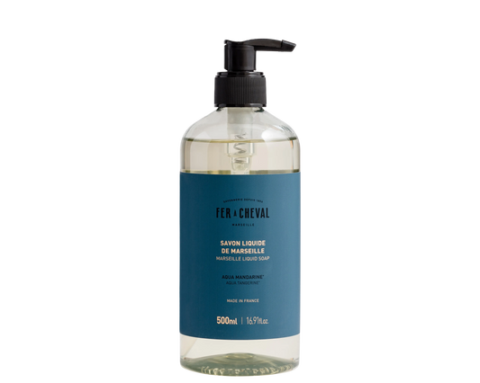 Clear bottle with blue label on a white background