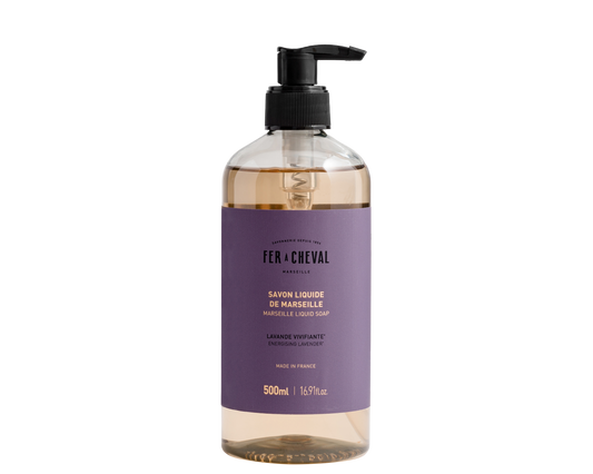 Bottle of Fé ç Cheval liquid soap with a pump on a white background