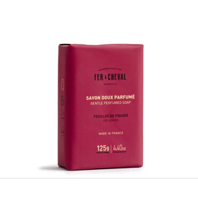 Red soap bar with branding on a white background