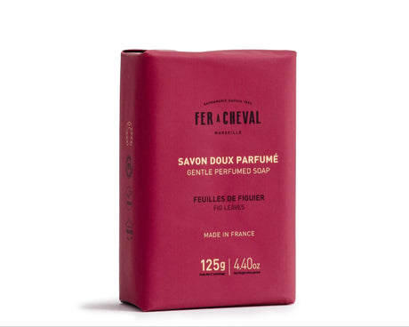 Red soap bar with branding on a white background