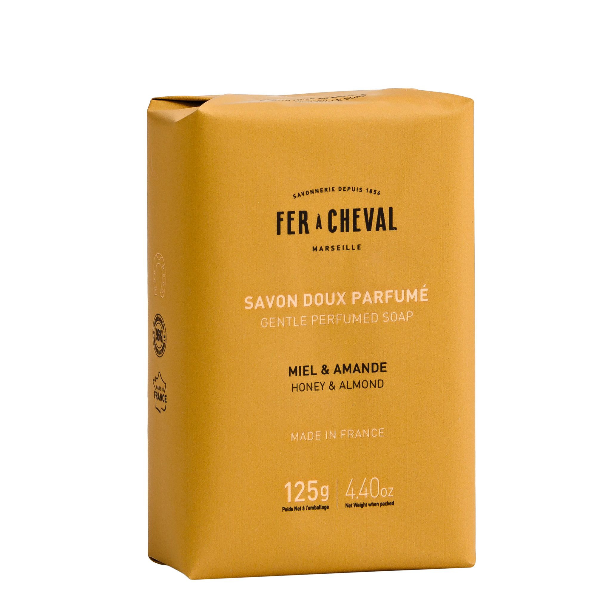 Yellow soap bar packaging with 'Fer a Cheval' branding on a white background
