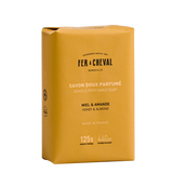 Yellow soap bar packaging with 'Fer a Cheval' branding on a white background
