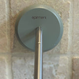 Apimani Olive Wood Soap Holder against a tiled wall