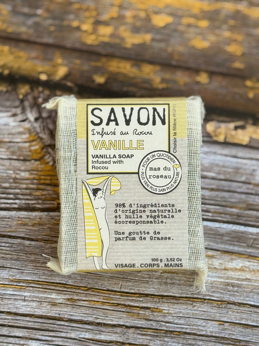 Vanilla Bar of vanilla soap with packaging on a wooden background