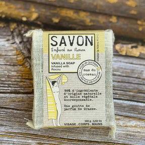 Vanilla Bar of vanilla soap with packaging on a wooden background
