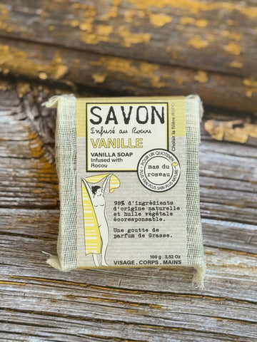 Vanilla Bar of vanilla soap with packaging on a wooden background
