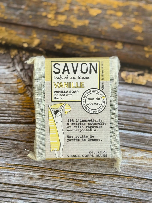 Vanilla Bar of vanilla soap with packaging on a wooden background