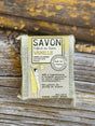 Vanilla Bar of vanilla soap with packaging on a wooden background