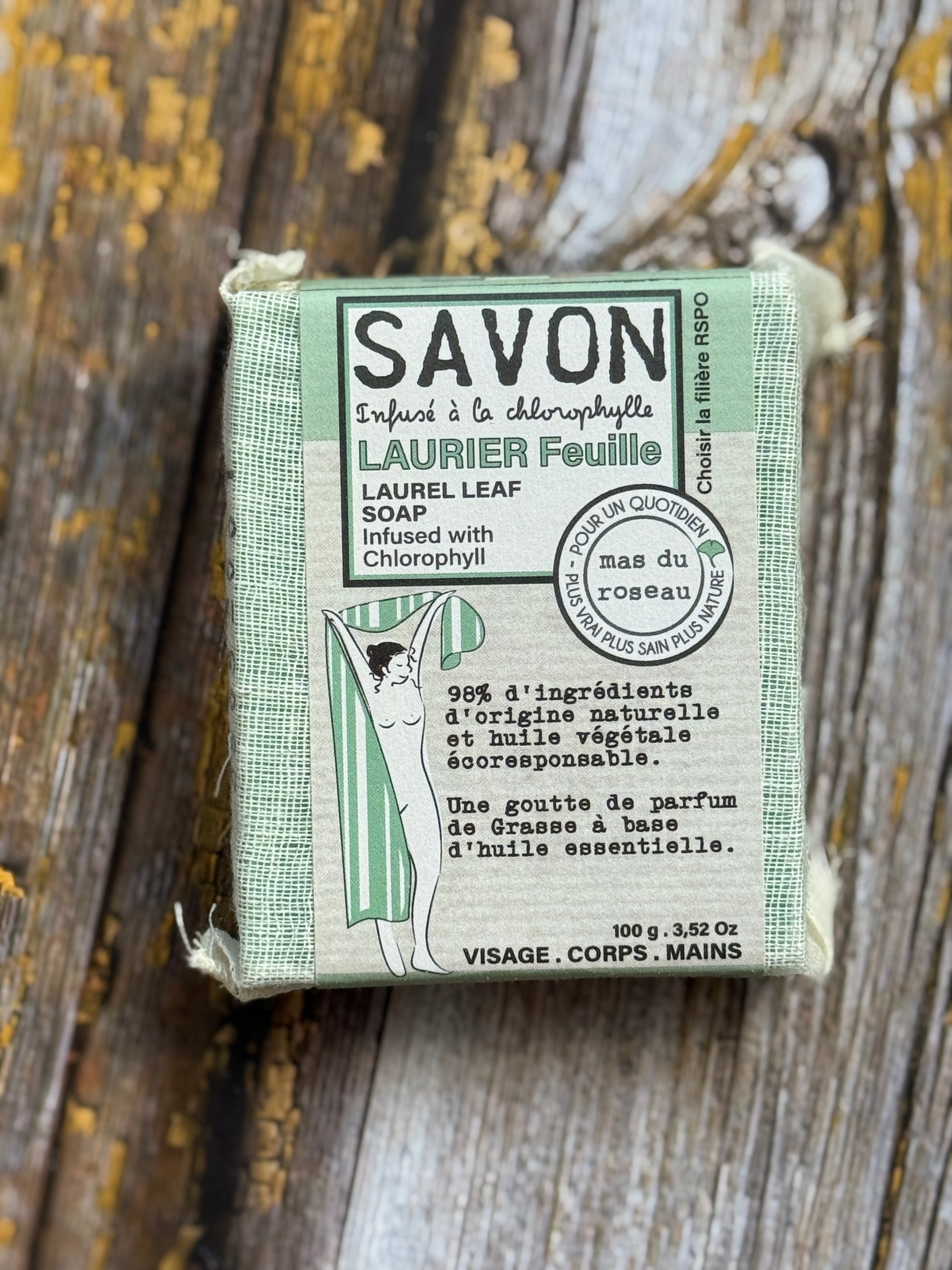Laurel Leaf Bar of soap with a green box on a wooden surface