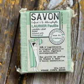 Laurel Leaf Bar of soap with a green box on a wooden surface