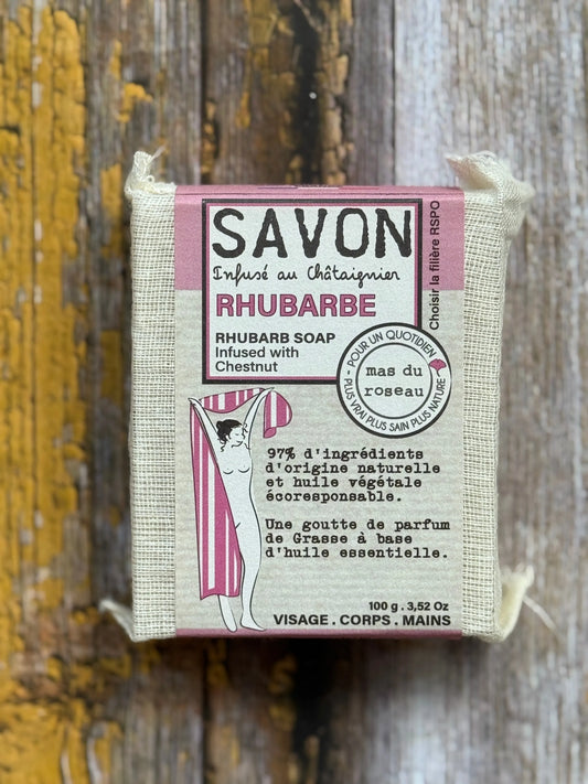 Rhubarb Bar of rhubarb soap with packaging on a wooden background