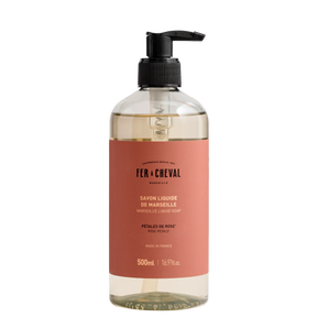 Bottle of Fx Cheval liquid soap with a pump on a white background