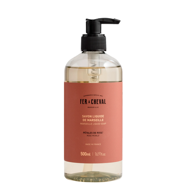 Bottle of Fx Cheval liquid soap with a pump on a white background
