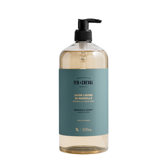 Bottle of Fér à Cheval Marseille Liquid Soap on a white background