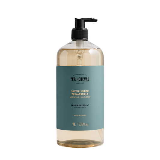 Bottle of Fér à Cheval Marseille Liquid Soap on a white background