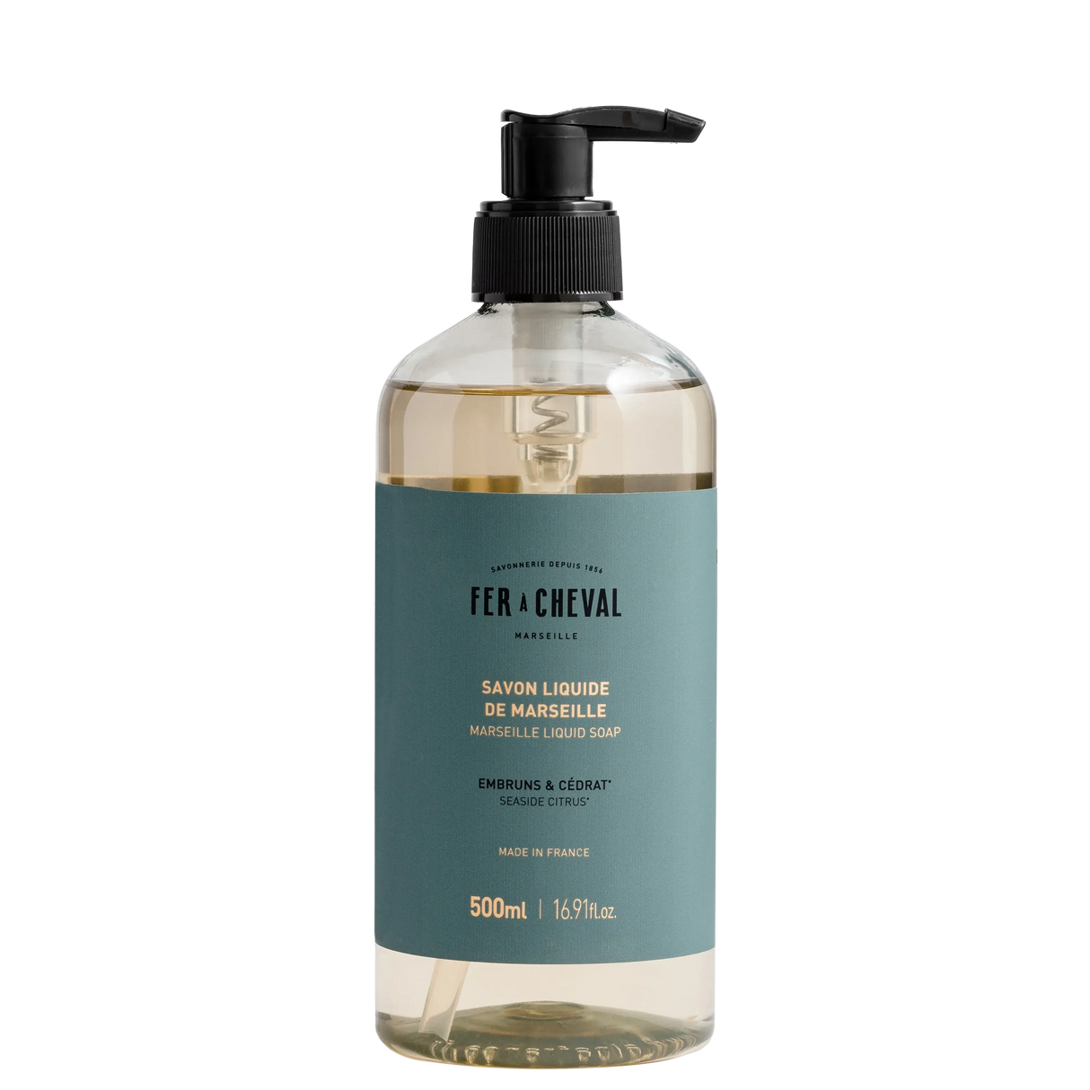 Bottle of Fér à Cheval liquid soap with pump on a white background