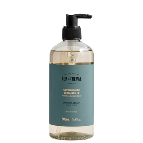 Bottle of Fér à Cheval liquid soap with pump on a white background