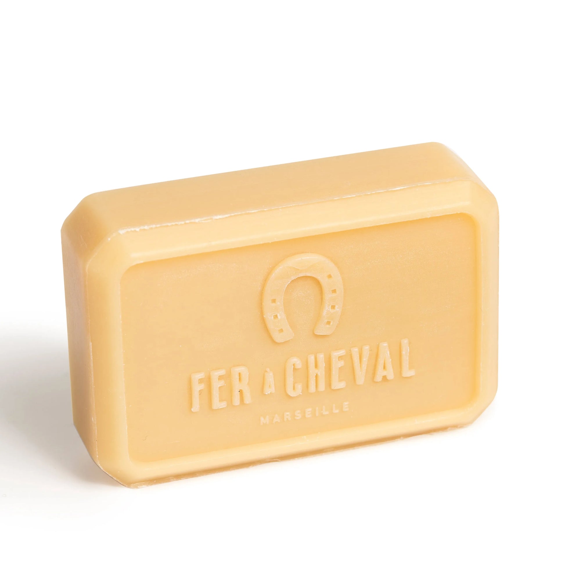 Bar of soap with 'Fer a Cheval' branding on a white background