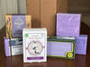 Collection of various Marseille soap bars in lavender fragrance  on a wooden surface