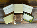 A collection of white Savon de Marseille Soap Bars on a wooden table